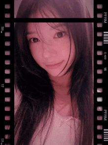 a woman 's face is framed by a strip of film that says pf1 c400 16