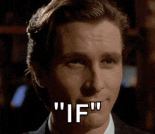 a close up of a man 's face with the words " if " on his face
