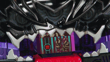 a purple and red toy with a red circle that says hamburger on it