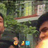 a blurry picture of a man and a woman with a blue o on the bottom