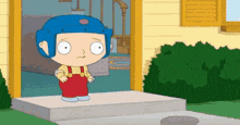 a cartoon character wearing a blue helmet and red overalls is standing on a porch .