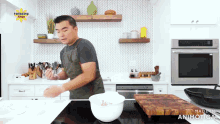 a man prepares food in a kitchen with a watermark that says made in animatica