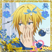 a picture of a boy with a blue bow on his head is surrounded by blue flowers