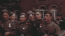 a group of soldiers with one wearing a medal with a star