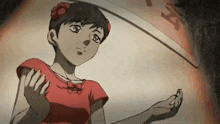 a girl with a flower in her hair is standing in front of a sign that says ' exit '