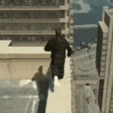 a man is running across a ledge in a city .
