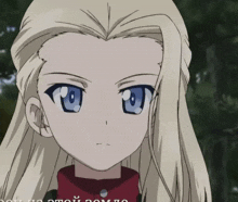 a close up of a girl 's face with a foreign language on the bottom