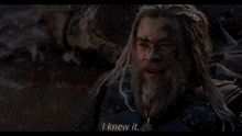 a man with long hair and a beard says " i knew it " in a movie scene