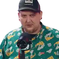 a man wearing a green shirt and a black hat that says leaderworth on it