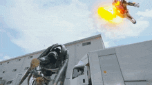 a man is flying through the air with a fireball coming out of his mouth