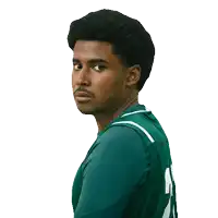 a man wearing a green jersey with the number 11 on the back