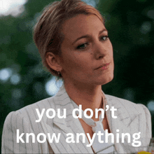 a woman in a striped suit says you don t know anything