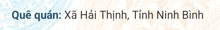 a blue and orange background with the words que quan xã hai thinh tinh ninh binh