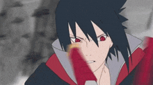 a cartoon character with red eyes and black hair is holding a red object in his hand .