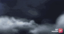 a gif of a man with horns and a gif maker logo