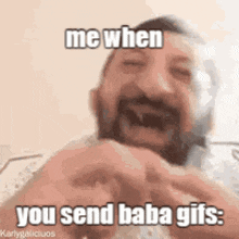 a man with a beard is laughing and saying `` me when you send baba gifs ''