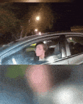 a man is driving a car with a sign that says first clip on the top