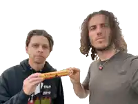 two men standing next to each other with one wearing a shirt that says 1969 2019
