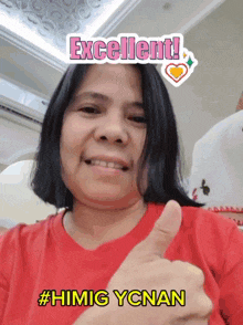a woman in a red shirt gives a thumbs up and says excellent #hinig ycnan