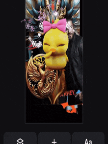 a picture of a duck with a pink bow and the name rhey