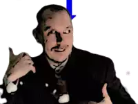 a man in a suit is giving a thumbs up sign