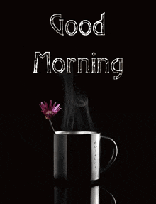 a cup of coffee with smoke coming out of it and the words " good morning "