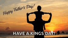 a silhouette of a man carrying a child on his shoulders .
