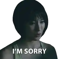 a woman says i 'm sorry in front of her face