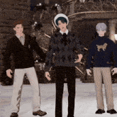 a man wearing a sweater that says rl is standing with two other men