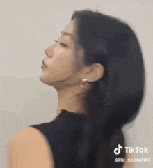 a woman 's face is shown in a tik tok video