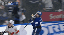 a hockey game is being played and the score is 1-0