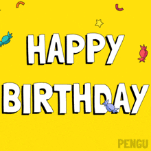 a happy birthday card with a penguin holding a cake with candles on it