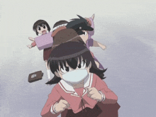 a girl wearing a mask has the letter b on her chest