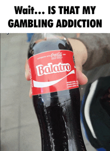 a person is holding a bottle of coca cola that says balatro on the label