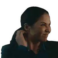 a close up of a woman 's face with a ponytail