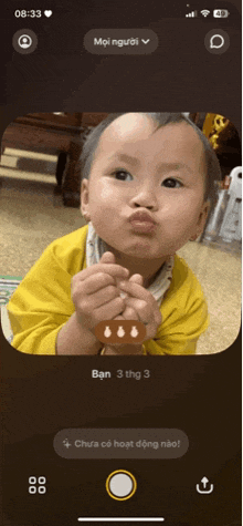 a baby making a face on a phone screen