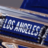 a close up of a los angeles sign on a machine