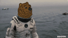 a cartoon drawing of a bear wearing a nasa space suit