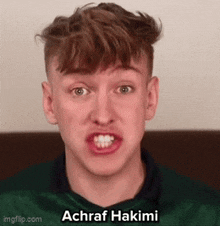 a young man is making a funny face and the name achraf hakimi is on the bottom of the image .