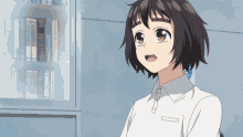 a girl in a white shirt is looking at something