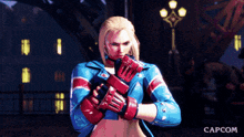 a video game character from capcom is holding a boxing glove