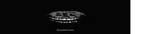 a black and white image of a skeleton with a smiley face on a black background .