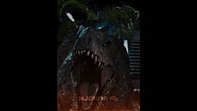 a close up of a dinosaur with its mouth open and its tongue out .