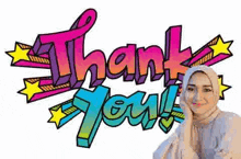 a woman is standing in front of a thank you sign .
