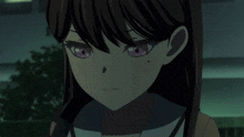 a close up of a girl with purple eyes and a black spot on her face