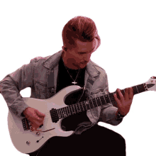 playing electric guitar cole rolland strumming guitar performing musical instrument