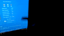 a blurred image of a computer screen with the word brave.com visible