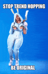 a woman in a bunny suit is dancing with the words stop trend hopping be original