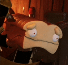a close up of a cartoon character making a face