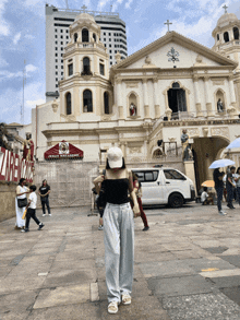 a white van is parked in front of a building with a sign that says " zibe " on it